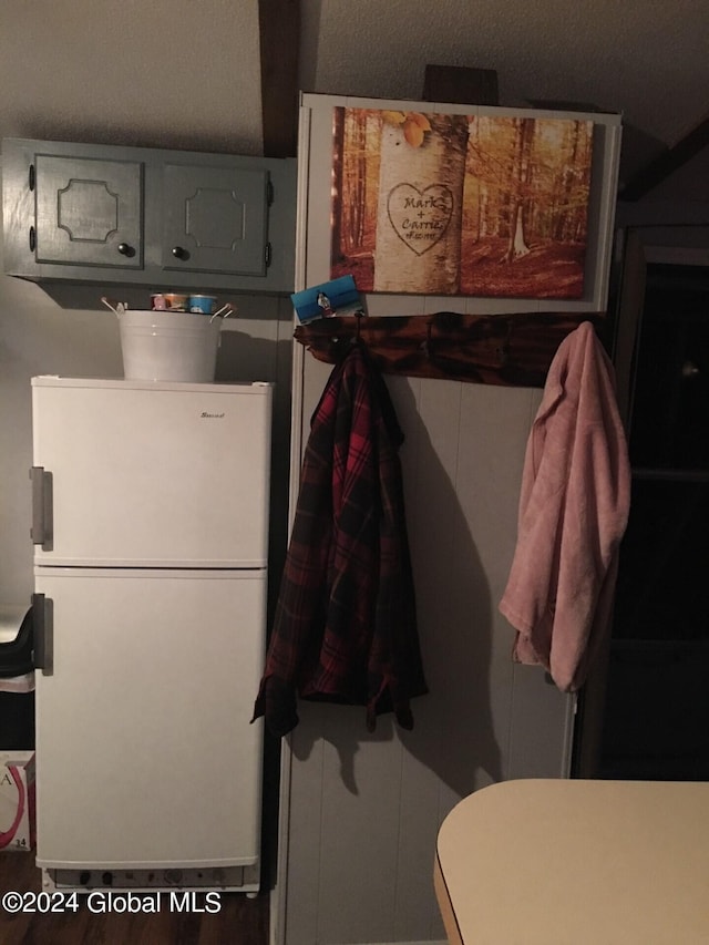 interior space featuring white fridge