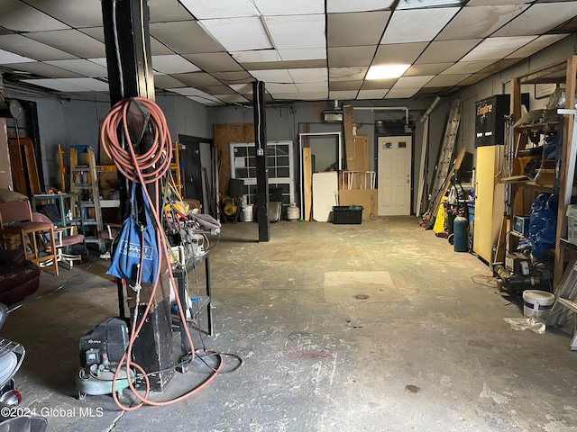 basement featuring a drop ceiling