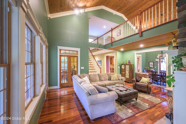 living room featuring french doors, dark hardwood / wood-style floors, high vaulted ceiling, and wooden ceiling