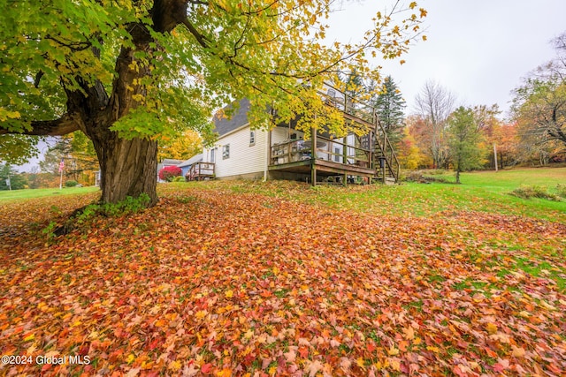 view of yard with a deck