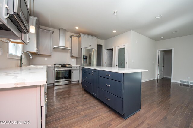 19 Hunter Ct, Milton, NY 12020 - kitchen featuring wall chimney range hood, stainless steel appliances, dark wood-style floors, a center island, and recessed lighting
