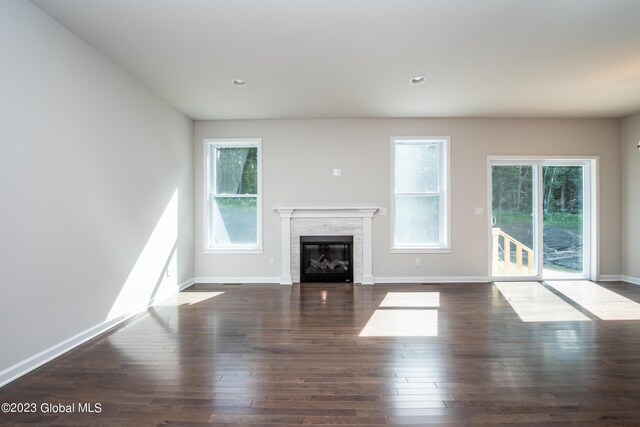19 Hunter Ct, Milton, NY 12020 - unfurnished living room with a glass covered fireplace, wood finished floors, baseboards, and recessed lighting