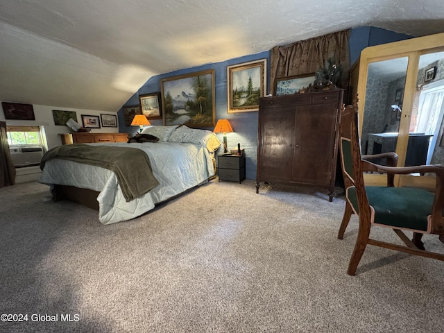 bedroom with light colored carpet and lofted ceiling