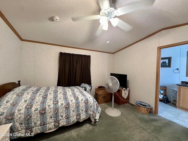 carpeted bedroom with ornamental molding, lofted ceiling, a textured ceiling, and ceiling fan