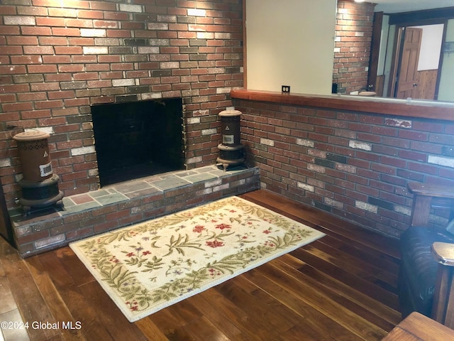 living room with dark hardwood / wood-style floors