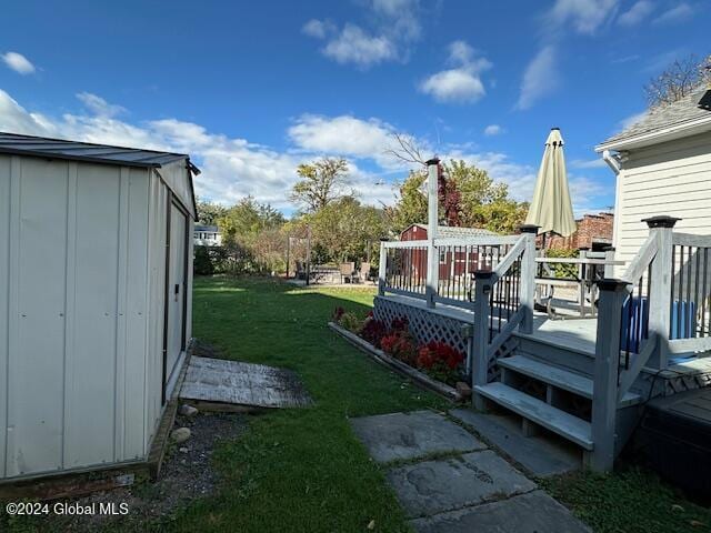 view of yard with a deck