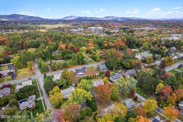 birds eye view of property with a mountain view