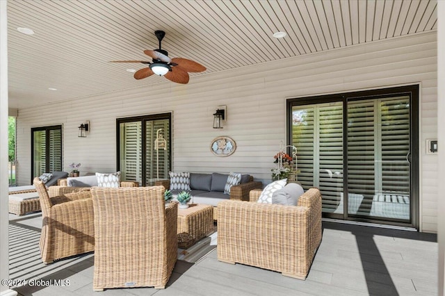 view of patio with ceiling fan and outdoor lounge area