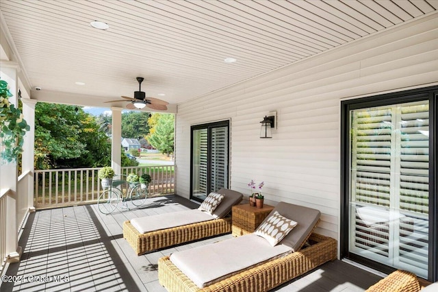 wooden deck with ceiling fan