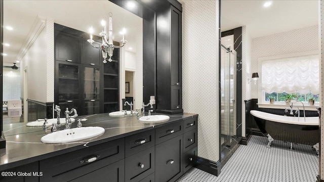 bathroom featuring vanity, tile patterned flooring, and plus walk in shower