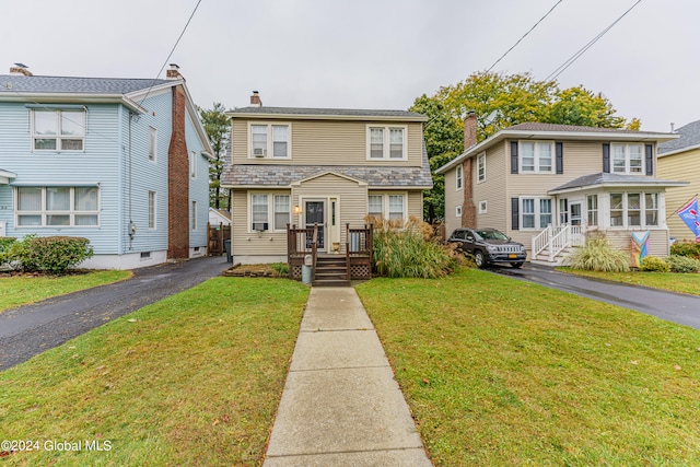 front of property featuring a front yard