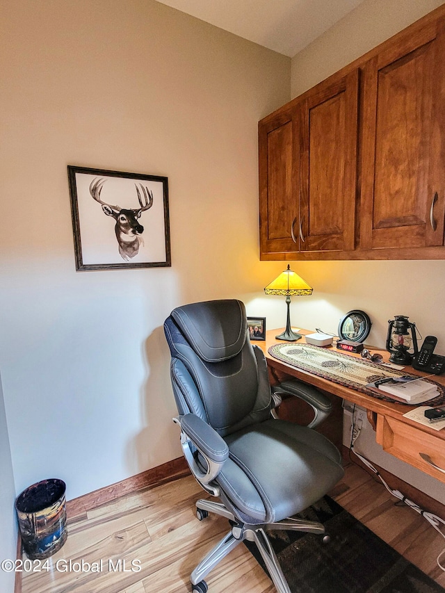 office area with light wood-type flooring