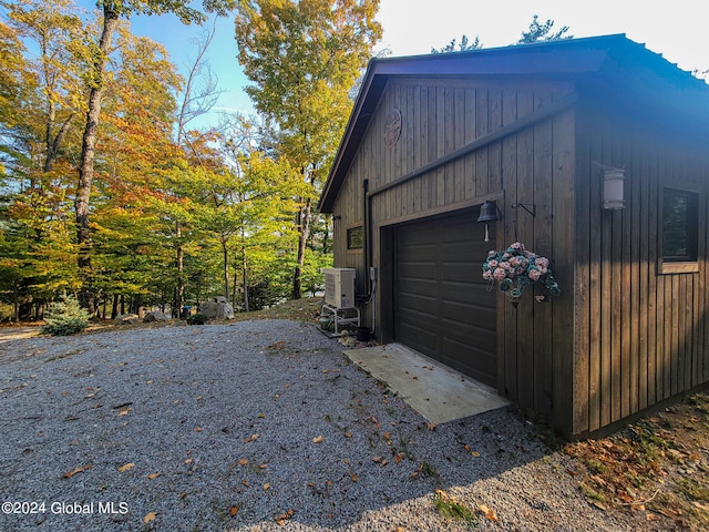 garage with wood walls