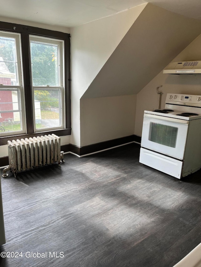 interior space featuring radiator heating unit, ventilation hood, dark wood-type flooring, white range with electric stovetop, and lofted ceiling