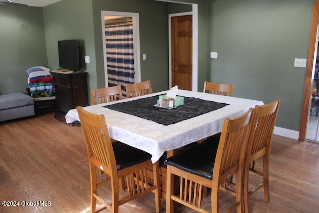 dining room with light wood-type flooring