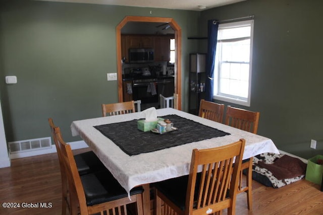 dining room featuring dark hardwood / wood-style floors