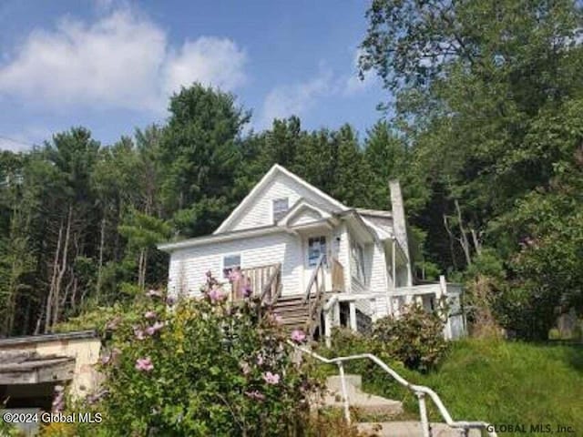 view of front of home with a deck