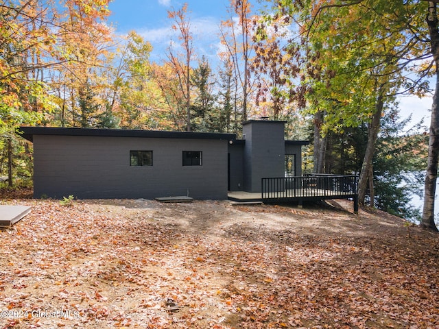 view of home's exterior featuring a deck