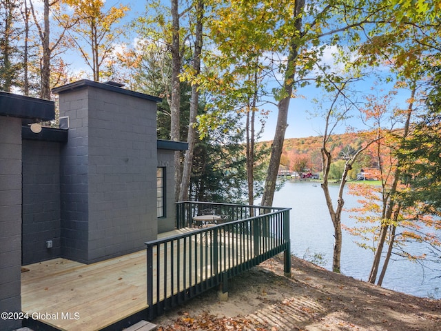 wooden terrace with a water view