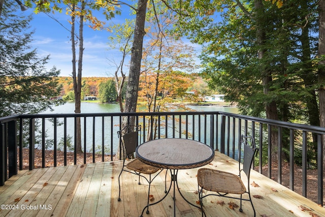 deck featuring a water view