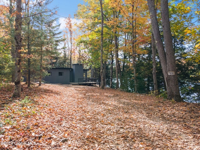 view of yard with a wooden deck