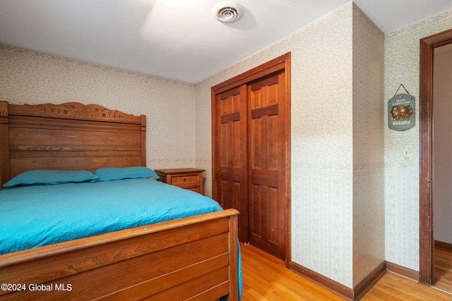 bedroom featuring light wood-type flooring