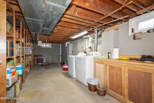 basement featuring washing machine and dryer