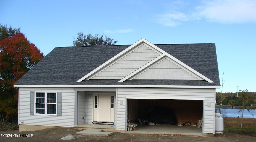 view of front of property with a garage