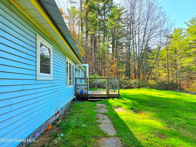 view of yard featuring a deck