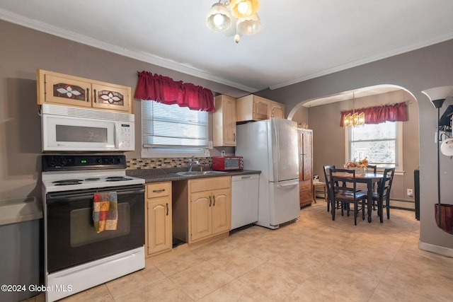 kitchen with ornamental molding, a healthy amount of sunlight, tasteful backsplash, and white appliances