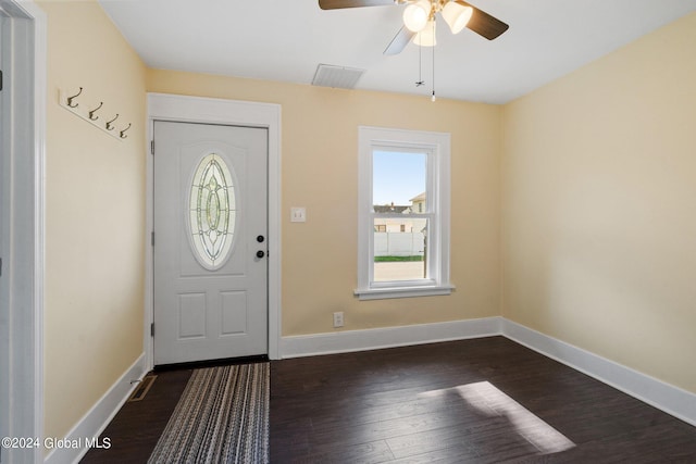 foyer entrance featuring ceiling fan and dark hardwood / wood-style flooring