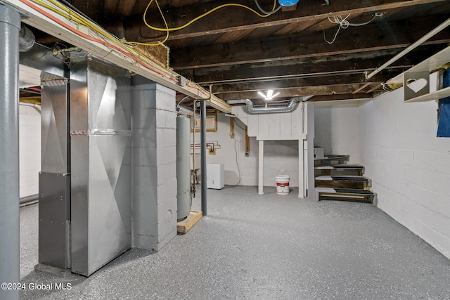 basement with heating unit and gas water heater