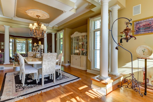 dining room featuring light hardwood / wood-style floors and an inviting chandelier