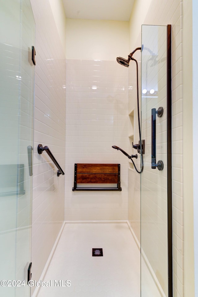 bathroom featuring walk in shower