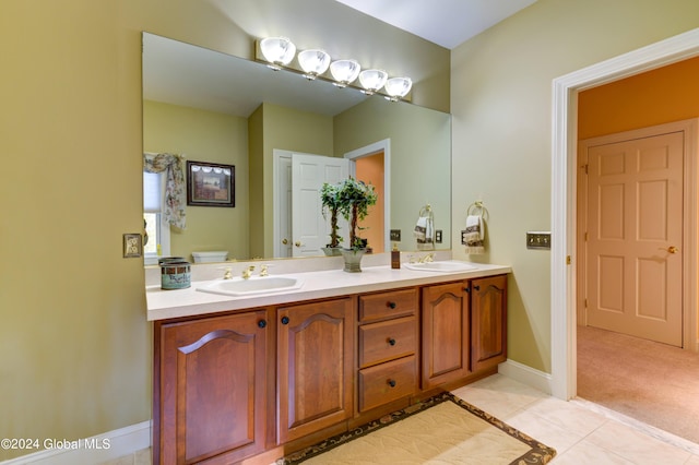 bathroom with vanity and tile patterned floors