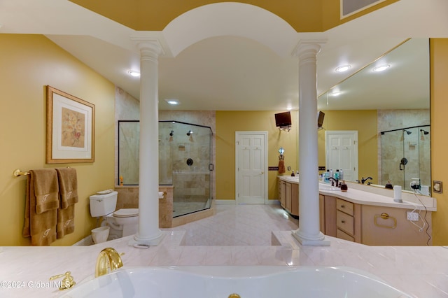 full bathroom featuring vanity, toilet, independent shower and bath, and decorative columns