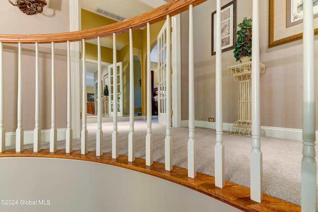 stairs with ornate columns