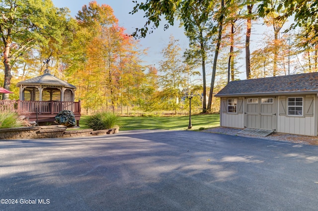 exterior space featuring a gazebo and a lawn