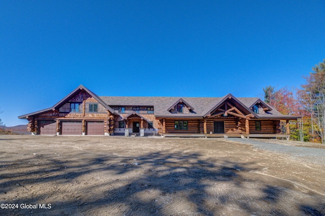 cabin featuring a garage