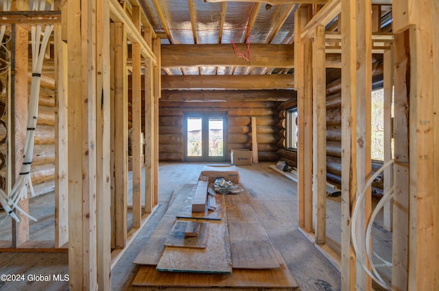 miscellaneous room featuring rustic walls