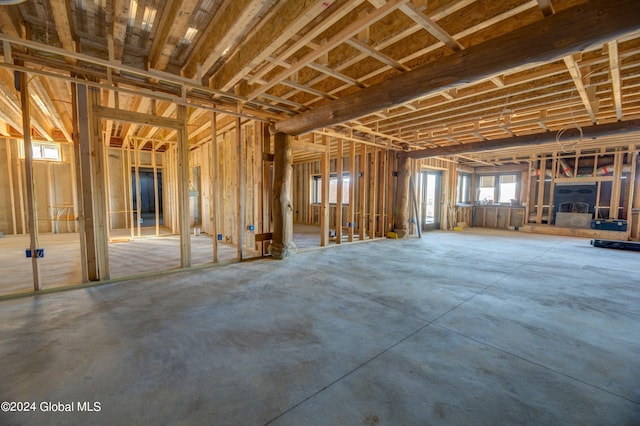 misc room with concrete flooring