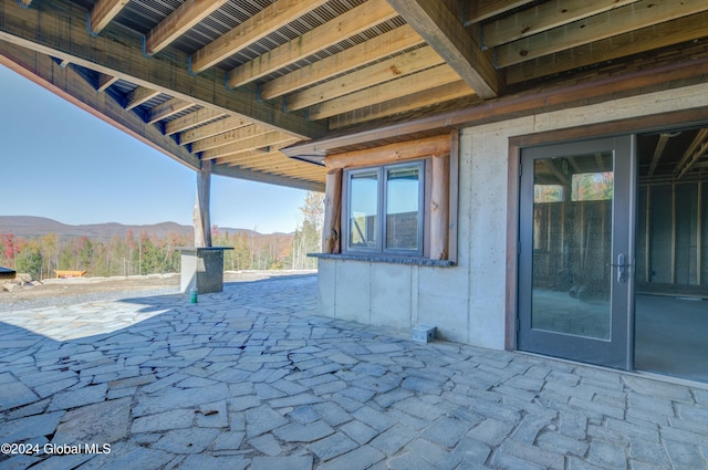 view of patio / terrace with a mountain view