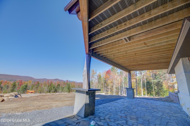 view of patio featuring a mountain view