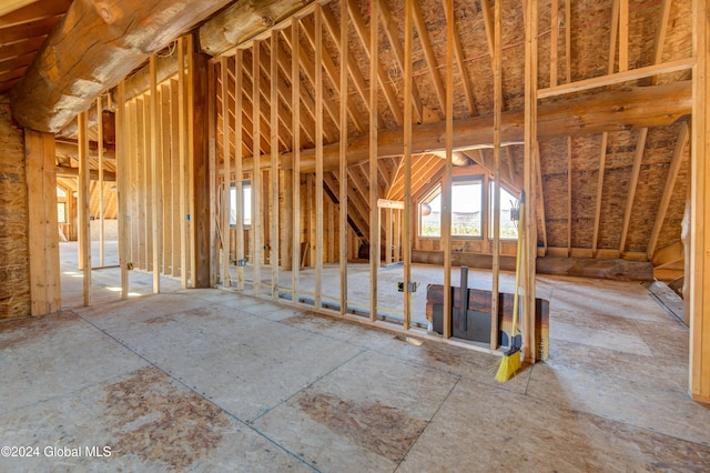 miscellaneous room featuring lofted ceiling