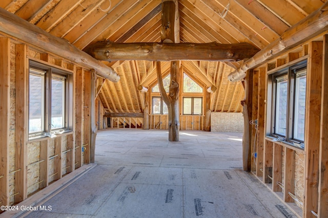 attic featuring plenty of natural light