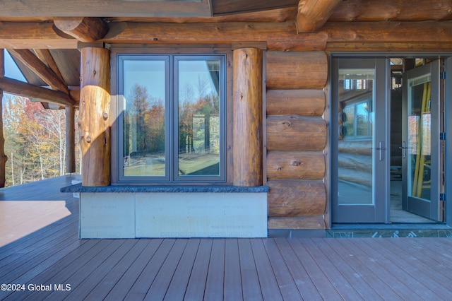 doorway to property with a wooden deck