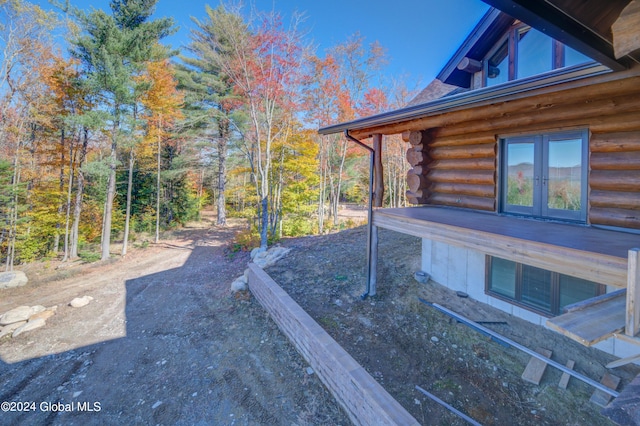 view of yard with french doors