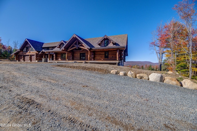 log home featuring a mountain view