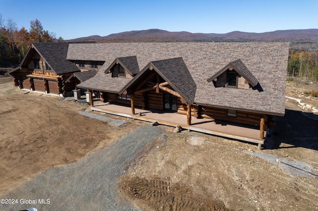 log home featuring a mountain view