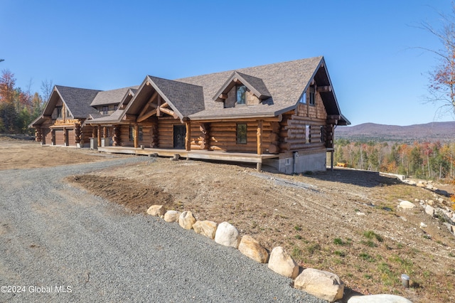 log-style house with a mountain view